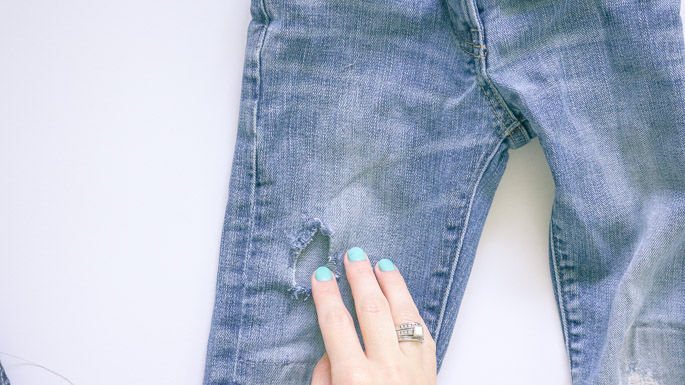 sewing torn jeans
